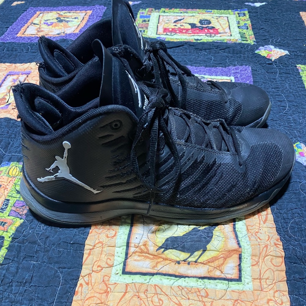 Micheal, Jordan’s super.fly size ten shoes